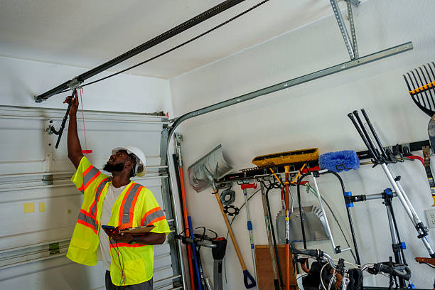 Professional Garage Door Spring Repair technician working in Olean, NY